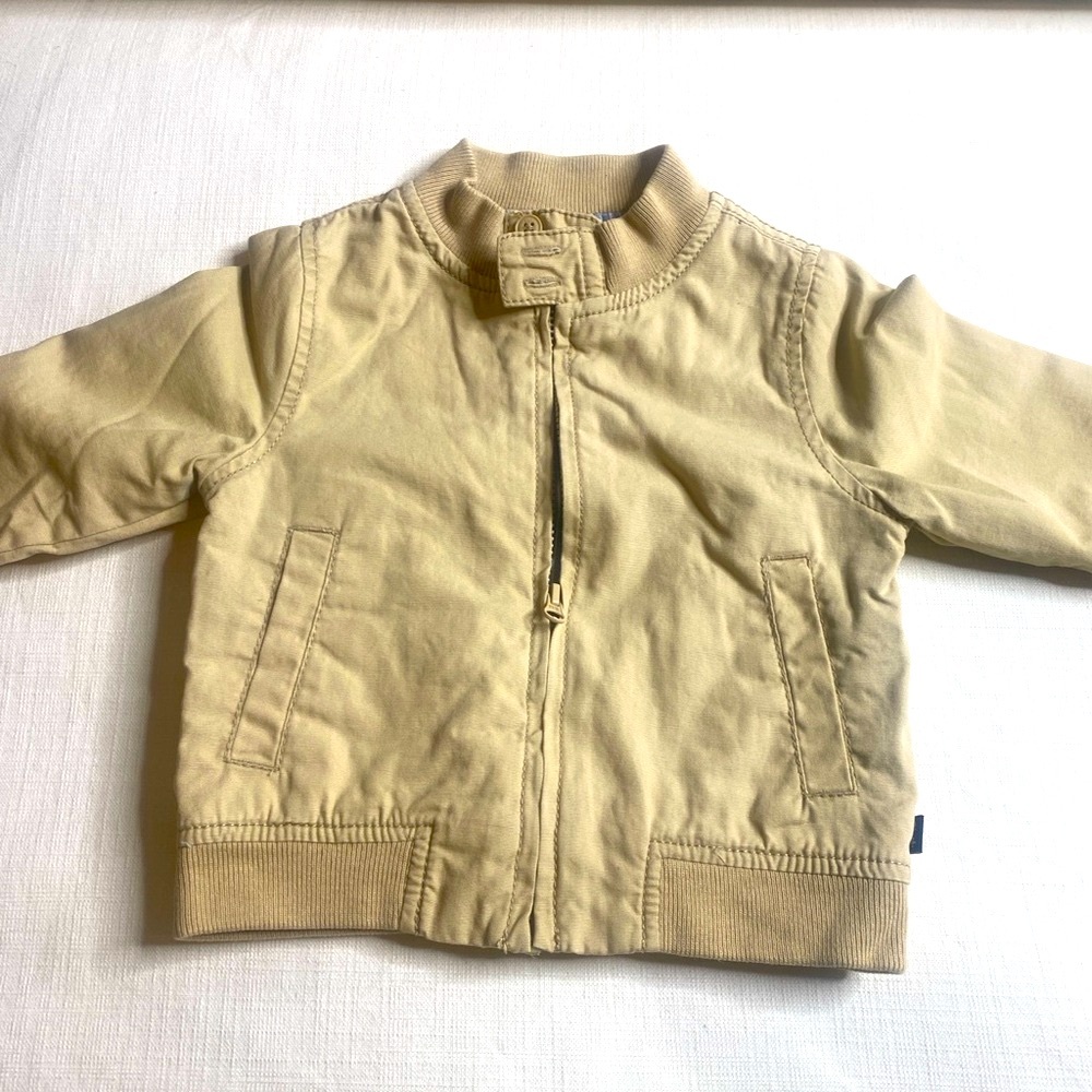 Oshkosh Baby B’Gosh 9 Months tan zipper Jacket with blue stripe linings.